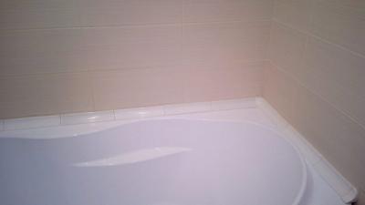 Как заделать стык между ванной и стеной Как заделать стык между ванной и стеной