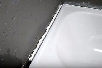Как заделать стык между ванной и стеной Как заделать стык между ванной и стеной